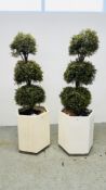 A PAIR OF HEXAGONAL PLANTERS CONTAINING TWO ARTIFICIAL TREES - HEIGHT 170CM. A/F.