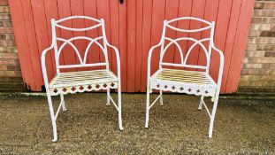 A PAIR OF WROUGHT METAL GARDEN CHAIRS.