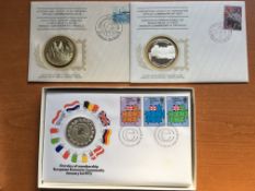 COINS: 1973-5 THREE MEDALLIC FIRST DAY COVERS, ALL WITH SOLID SILVER CROWN SIZE MEDALLIONS.