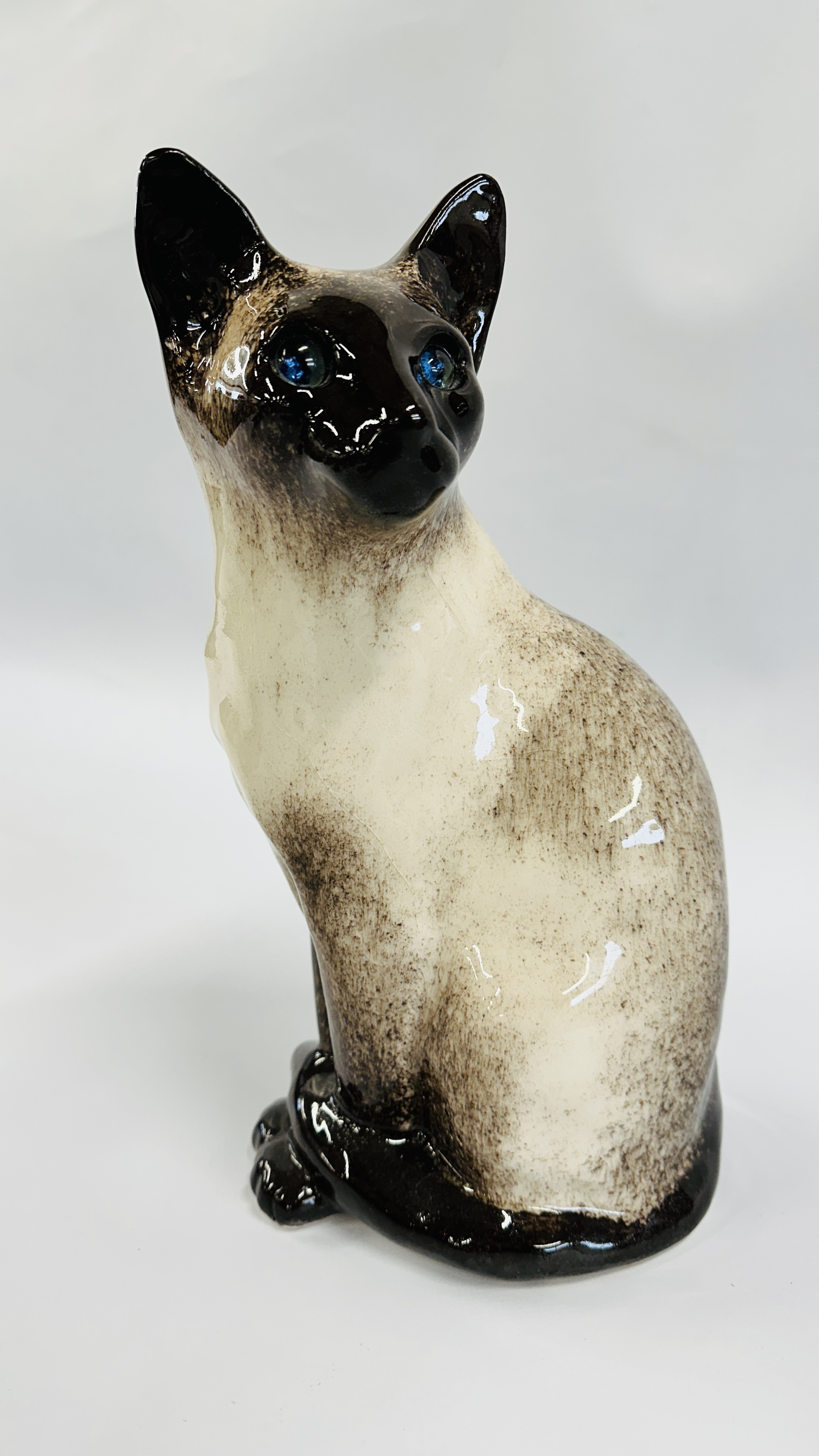 A HANDCRAFTED WINSTANLEY NO. 5 SEATED CAT FIGURE - HEIGHT 32CM.