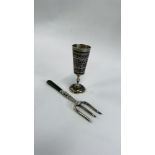 A RUSSIAN SILVER NIELLO LIQUEUR OR CUP WITH A JADE AND STERLING SILVER SERVING FORK.