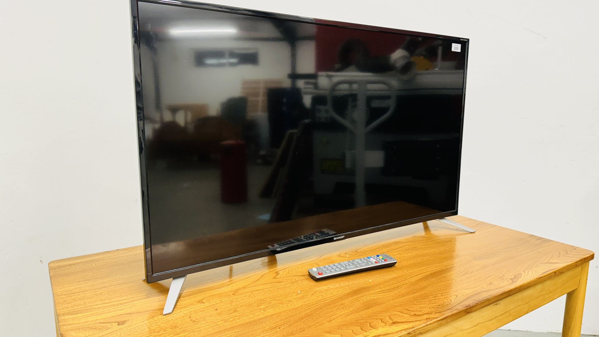 SHARP 42" FLAT SCREEN TV WITH REMOTE - SOLD AS SEEN. - Image 2 of 5