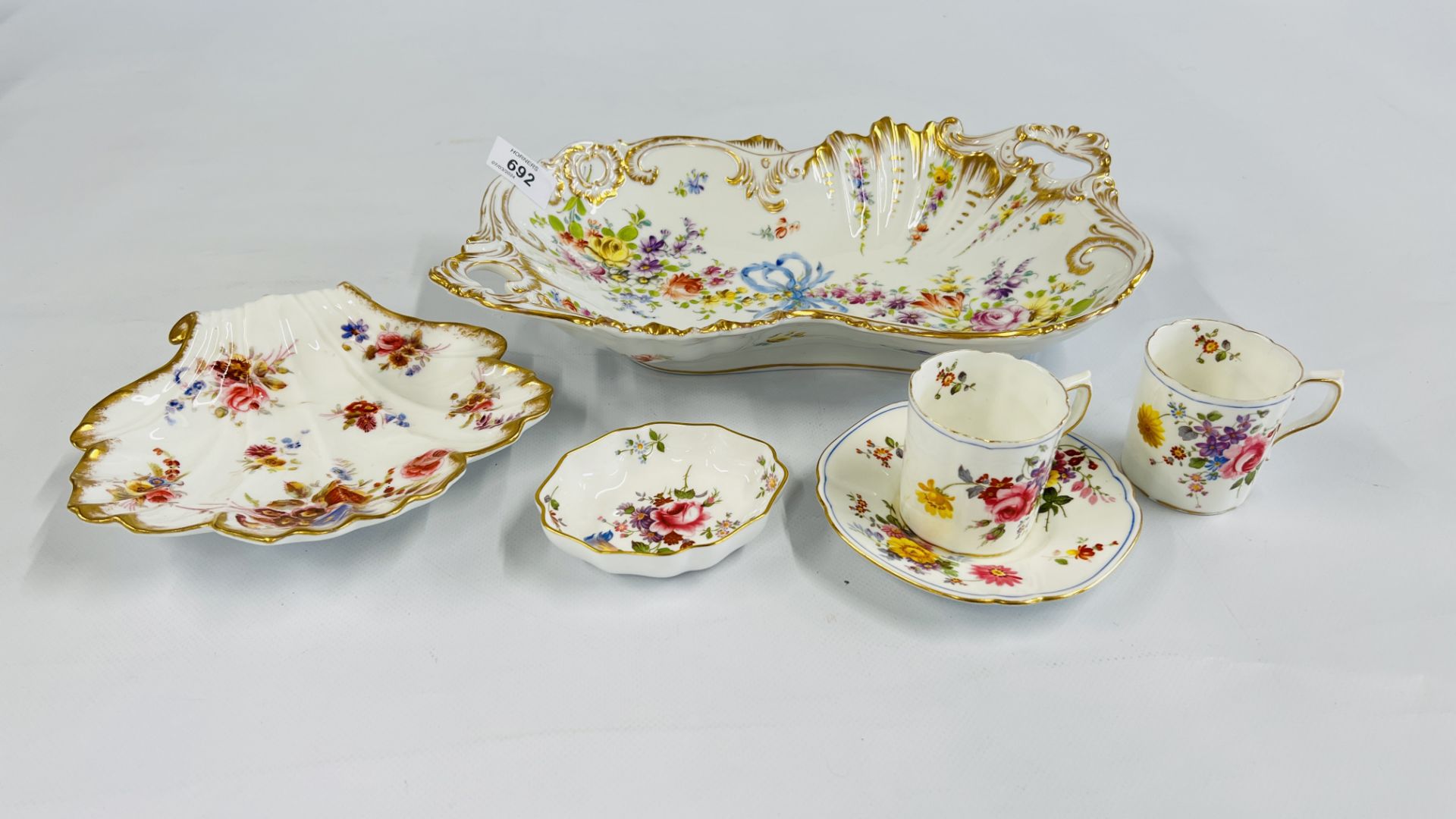 AN ELABORATE PORCELAIN TWO HANDLED DISH MARKED DRESDEN,