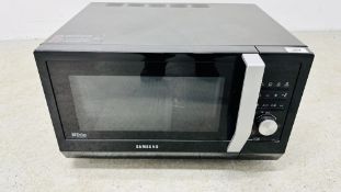 SAMSUNG MICROWAVE OVEN MODEL CE117A - SOLD AS SEEN.