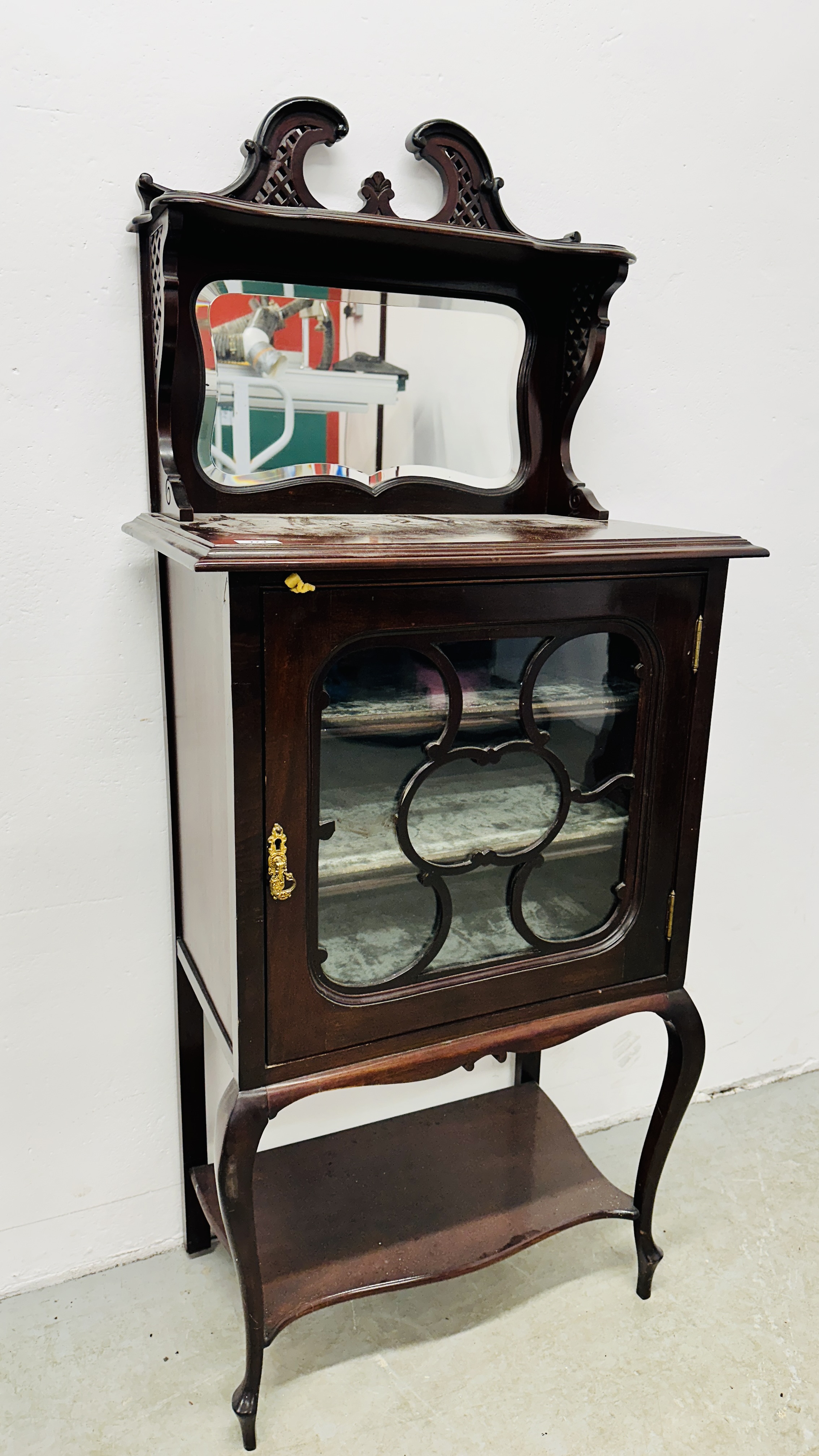 A VICTORIAN MAHOGANY SHEET MUSIC CABINET WITH MIRRORED UPSTAND AND FRETWORK PEDIMENT,