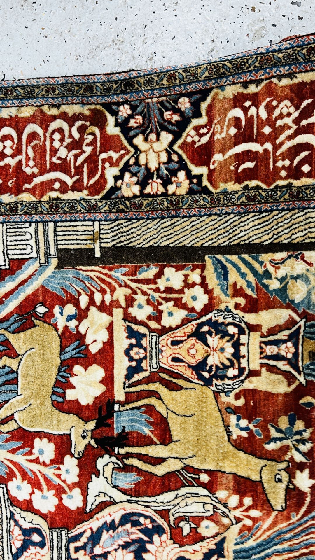 A PERSIAN DESIGN RUG DECORATED WITH SPRAYS OF FLOWERS AND DEER AND ARABIC INSCRIPTIONS, - Image 21 of 32