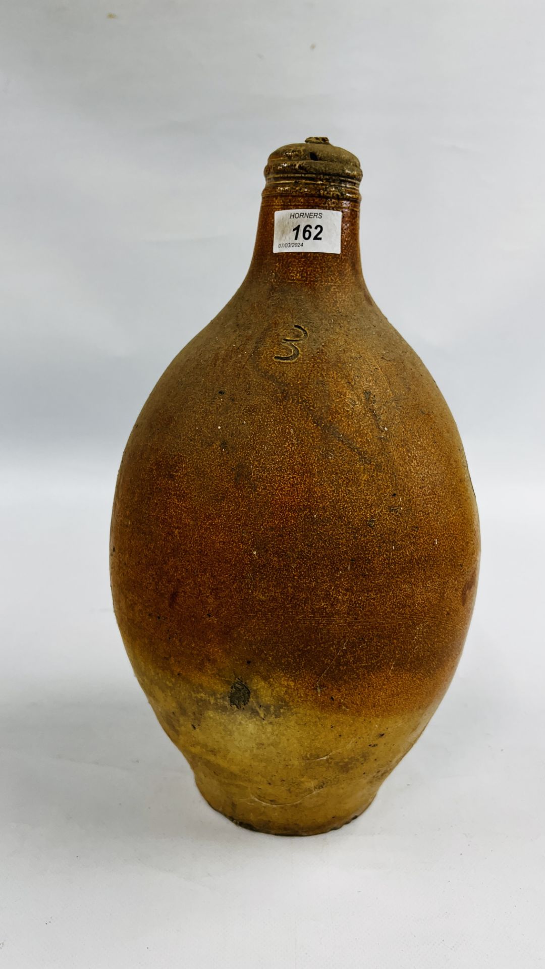 AN ANTIQUE STONEWARE C18th JUG "3" WITH ORIGINAL CORK STOPPER, H 40CM.