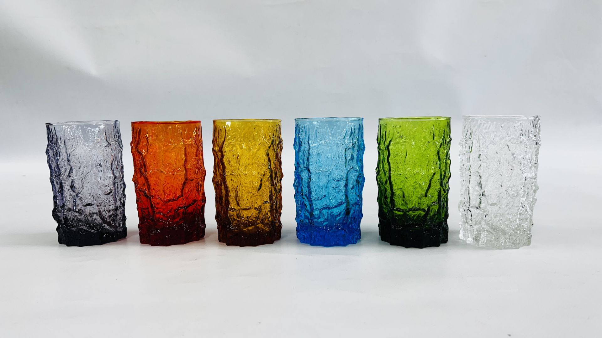 6 COLOURED WHITE FRIARS STYLE GLASSES, H 14CM.