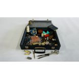 A CASE CONTAINING COLLECTIBLES TO INCLUDE LIGHTERS, COMPASS SHIELD, SINGAPORE MONEY CLIP,