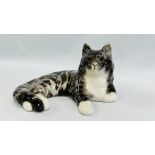 A HANDCRAFTED WINSTANLEY NO. 7 LAYING CAT FIGURE - HEIGHT 19CM, LENGTH 33CM.