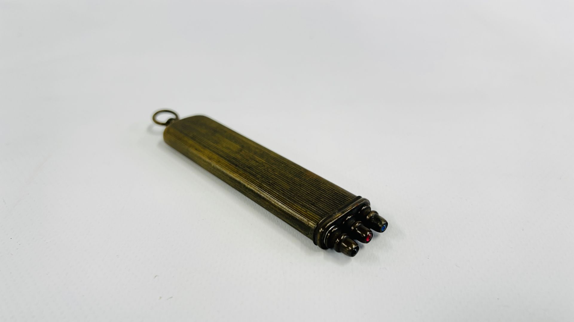A VINTAGE BRASS CASED POCKET DRAWING SET COMPRISING OF A PEN, PENCIL AND KNIFE, L 10CM.