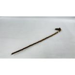 A C19th VINTAGE BRIAR WOOD WALKING STICK THE HANDLE CARVED WITH A GENTLEMAN'S FACE, L 89CM.