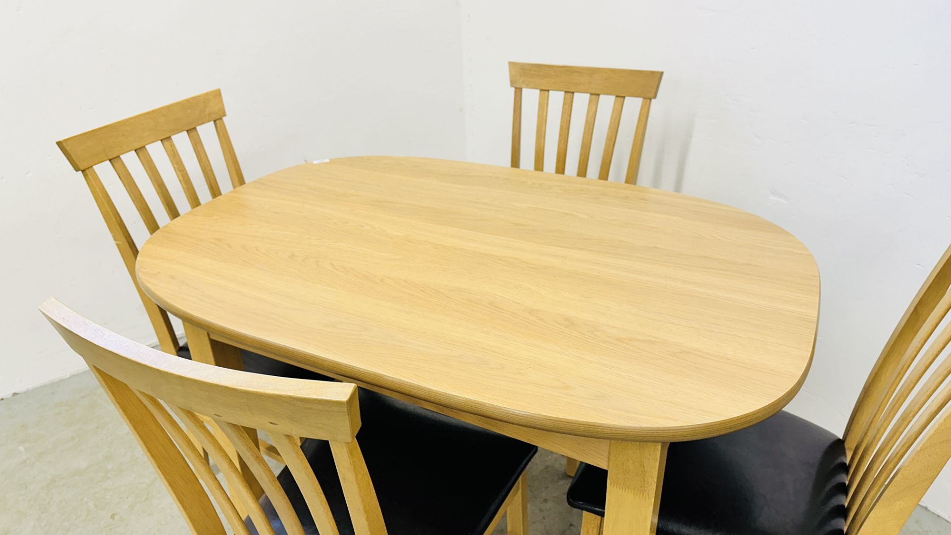 MODERN BEECHWOOD FINISH DINING TABLE AND SET OF 4 MATCHING CHAIRS WITH FAUX LEATHER SEATS. - Image 3 of 12