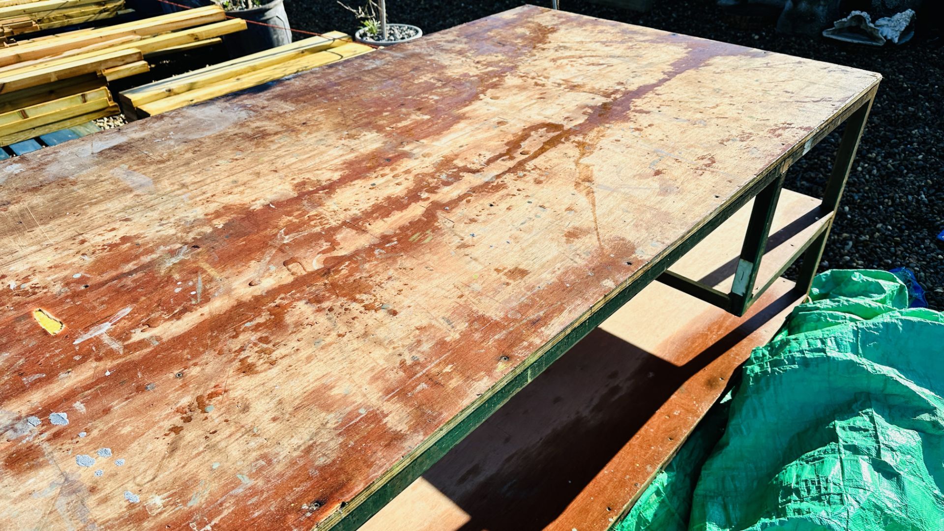 A HEAVY DUTY STEEL FRAMED WORK BENCH 122 X 244CM. THIS LOT IS SUBJECT TO VAT ON HAMMER PRICE. - Image 5 of 5