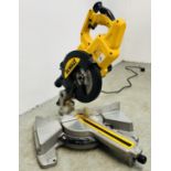 DE WALT COMPOUND MITRE SAW MODEL DWS773 - SOLD AS SEEN. THIS LOT IS SUBJECT TO VAT ON HAMMER PRICE.