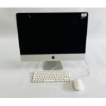 AN APPLE MAC DESKTOP COMPUTER 21.5" COMPLETE WITH APPLE KEYBOARD AND MOUSE - SOLD AS SEEN.