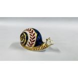 A ROYAL CROWN DERBY "SNAIL" PAPERWEIGHT.