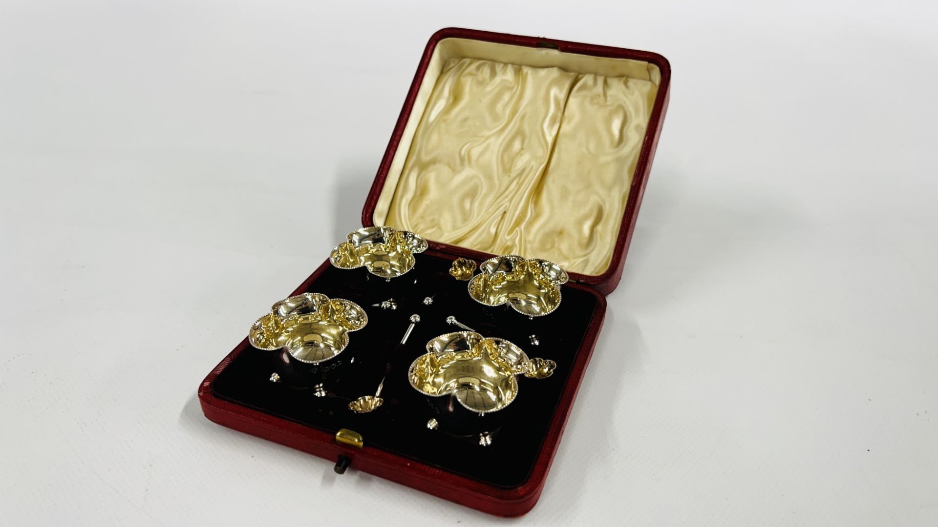 CASED SET OF FOUR VICTORIAN SILVER SALTS WITH SPOONS LONDON 1897 MAKER WOLFSKY & Co LTD.