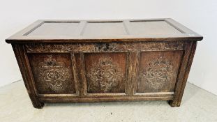 A C17th OAK COFFER, DATED 1686, WITH ALTERATIONS INCLUDING A NEW TOP, 134CM WIDE.