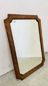 A VINTAGE OAK FRAMED WALL MIRROR WITH BEVELLED GLASS AND BEADED DETAIL, W 75CM X D 106CM.