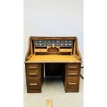 OAK TWIN PEDESTAL ROLL TOP DESK WITH FITTED INTERIOR, W 122CM X D 79CM X H 128CM.