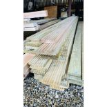 33 LENGTHS (MINIMUM 3.9 METRES) OF 145MM X 30MM TANALISED DECKING BOARDS.