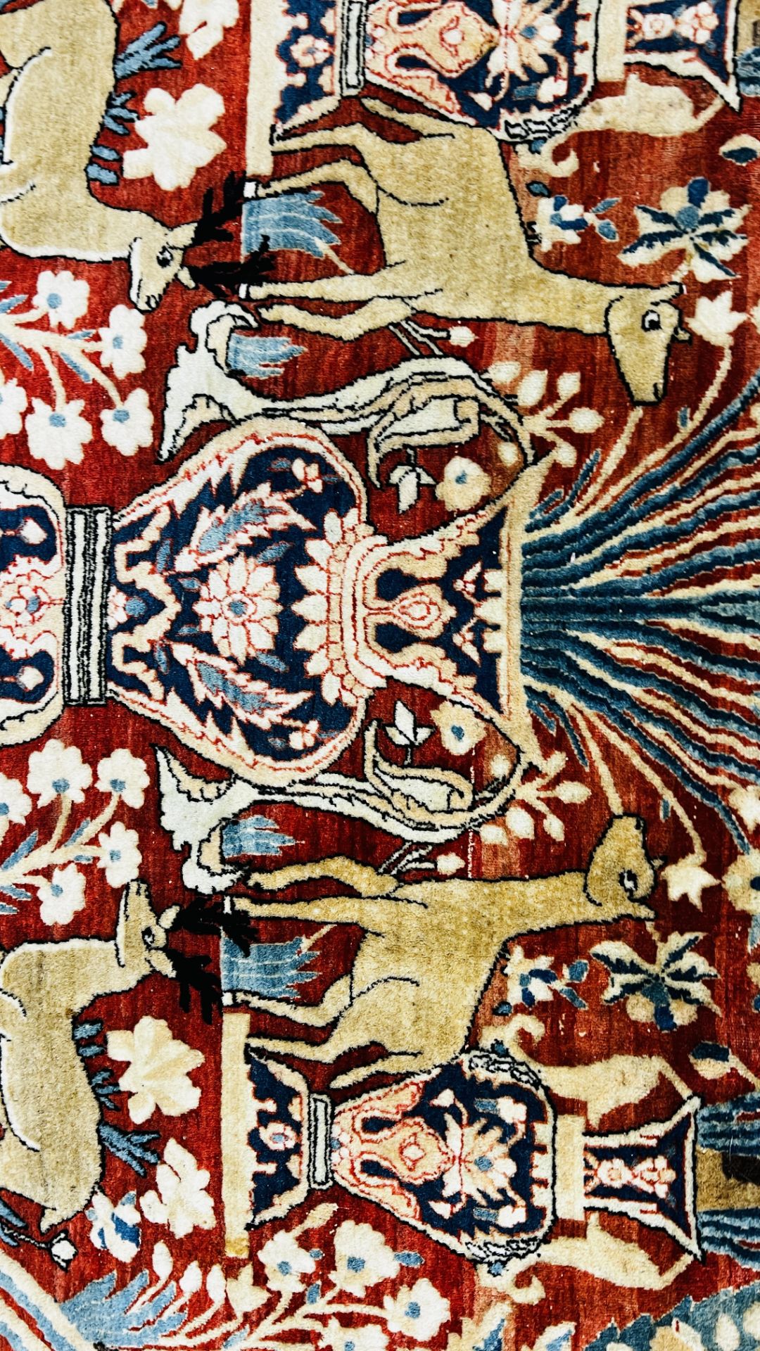 A PERSIAN DESIGN RUG DECORATED WITH SPRAYS OF FLOWERS AND DEER AND ARABIC INSCRIPTIONS, - Image 22 of 32