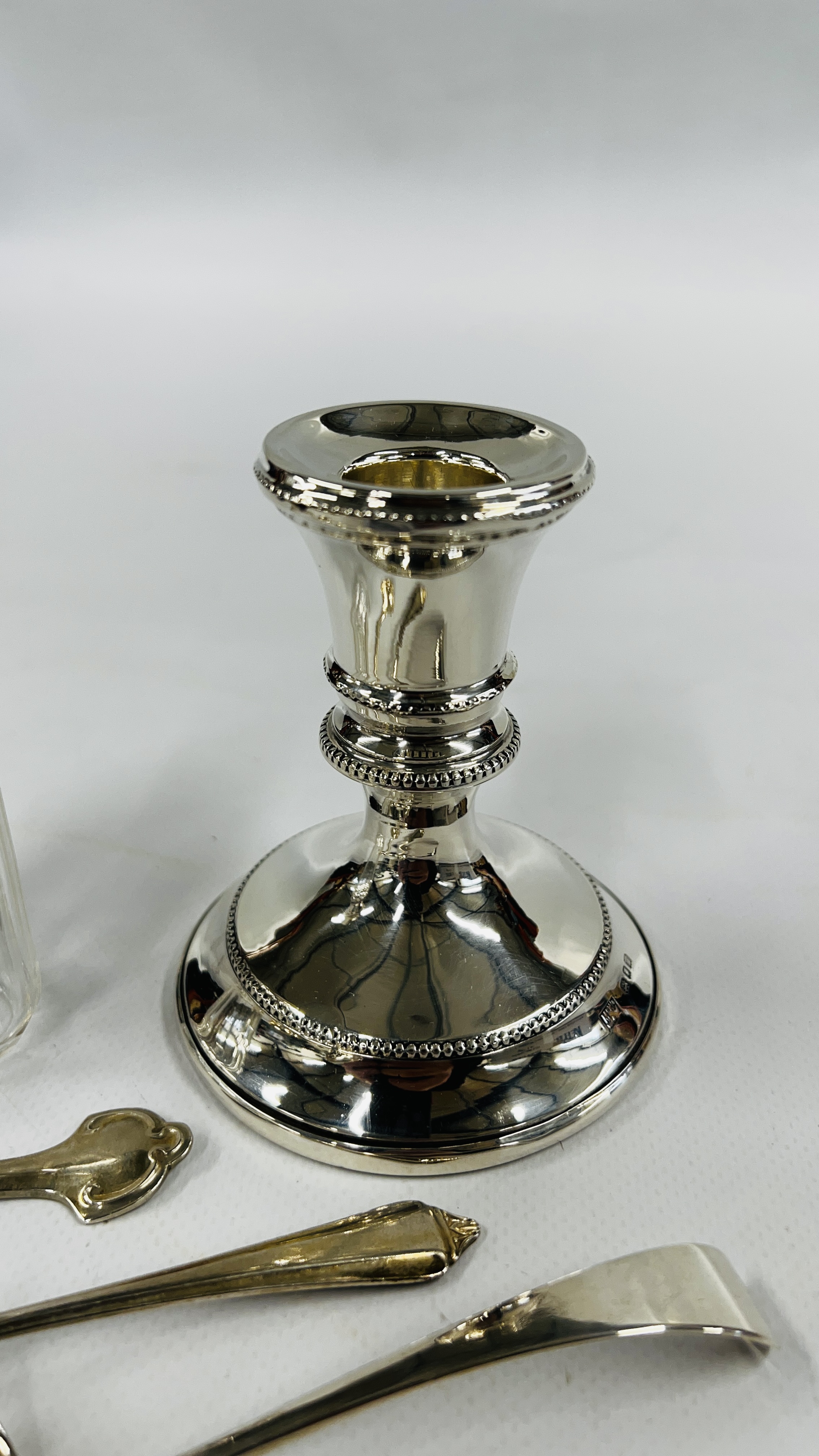 A SILVER SQUAT CANDLESTICK LONDON ASSAY (FILLED) H 8. - Image 2 of 9