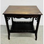 A HARDWOOD CARVED FRETWOOD OCCASIONAL TABLE WITH LOWER GALLERIED TIER W 75CM X D 56CM X H 72CM.