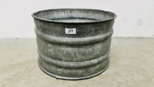 A GALVANISED SHALLOW RIBBED BUCKET.