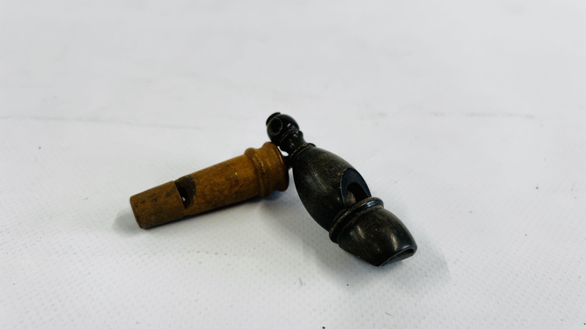 2 ANTIQUE TREEN WHISTLES.