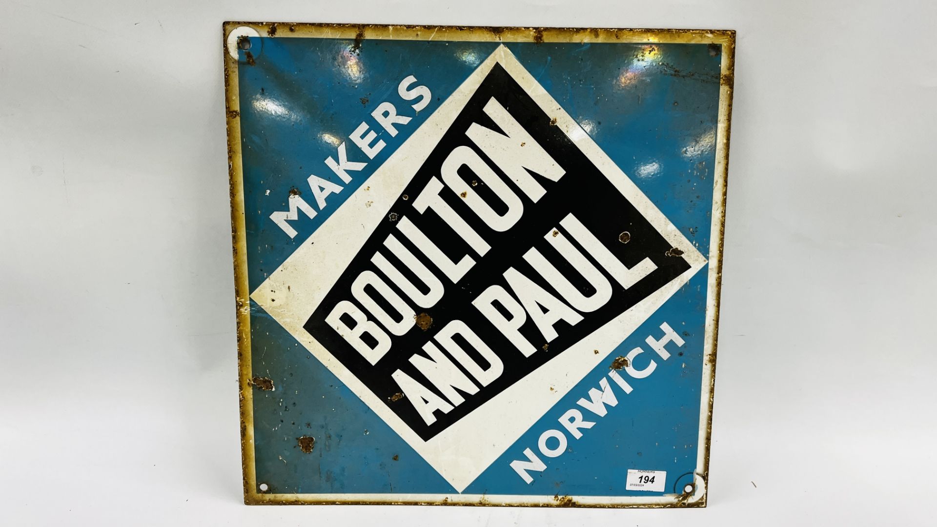 AN ORIGINAL VINTAGE ENAMEL SIGN "BOULTON AND PAUL" MAKERS NORWICH 46 X 46CM.