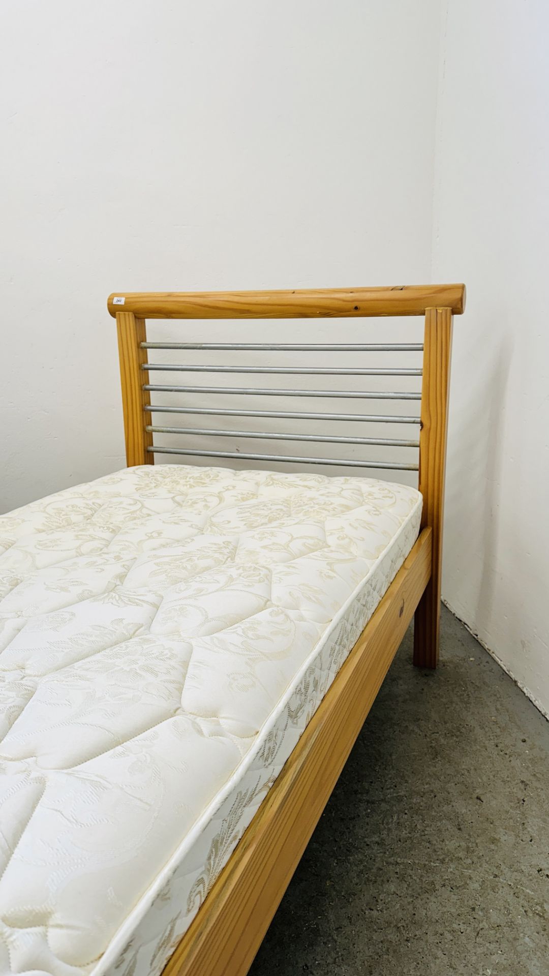 A MODERN PINE FRAMED SINGLE BED WITH STAINLESS STEEL BAR HEADBOARD COMPLETE WITH DORLUX FLEXIFORM - Image 7 of 7