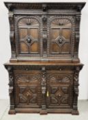 AN IMPRESSIVE ANTIQUE GOTHIC TYPE HEAVILY CARVED CUPBOARD DRESSER,