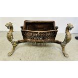 LARGE ANTIQUE CAST IRON FIRE BASKET, THE HEAVY BRASS FORELEGS DETAILED WITH MYTHICAL CREATURES,