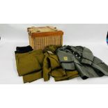 A COLLECTION OF MILITARY UNIFORMS IN A WICKER M.O.D. BOX.