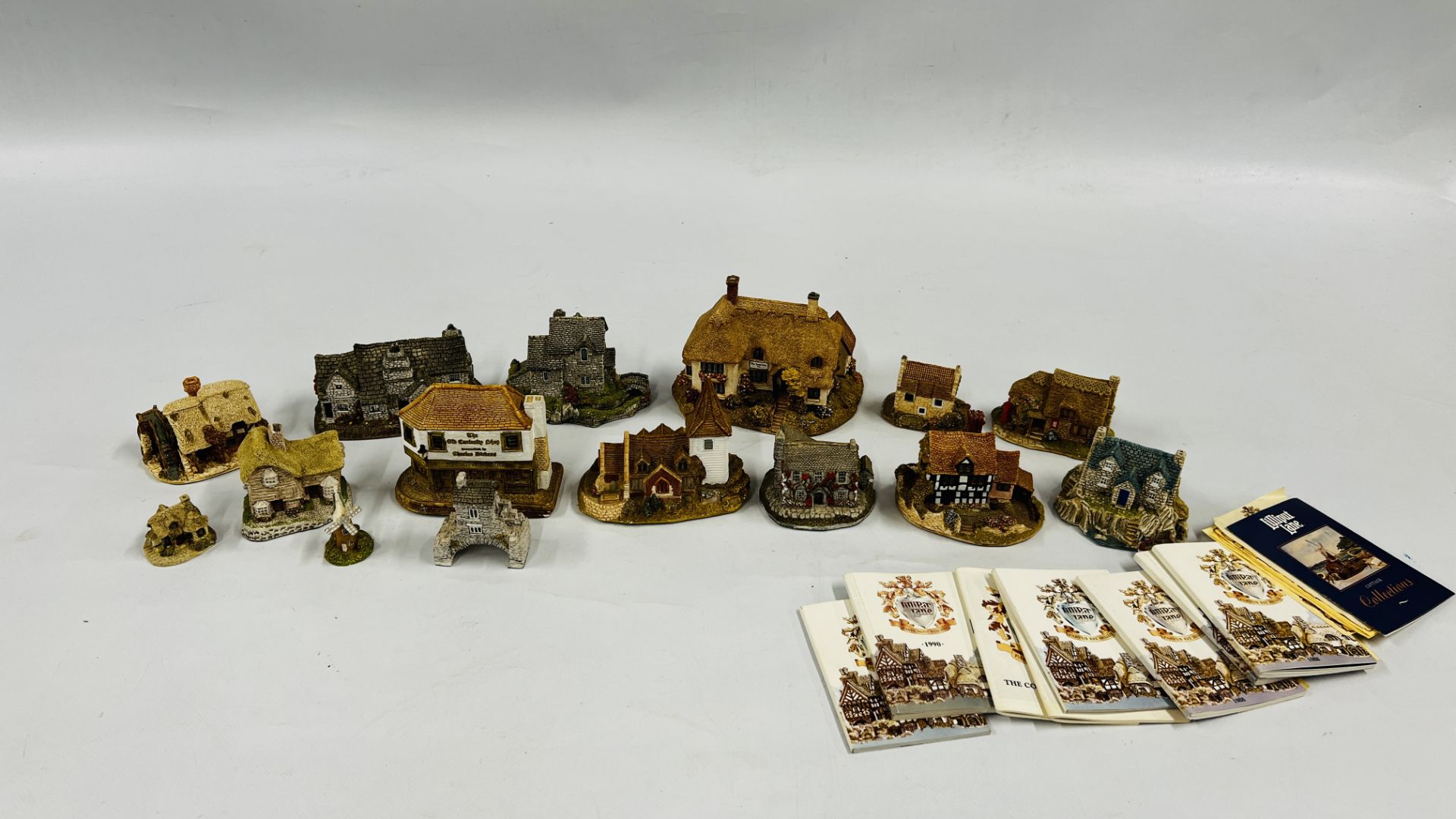 A COLLECTION OF 13 LILLIPUT LANE COTTAGES, SOME HAVING DEEDS ALONG WITH LILLLIPUT LANE BOOKLETS.