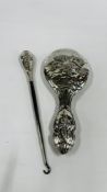 A SILVER MOUNTED DRESSING MIRROR & BUTTON HOOOK DEPICTING ANGELS, BIRMINGHAM ASSAY.