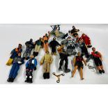 A BOX CONTAINING A GROUP OF 16 ASSORTED ACTION MAN FIGURES IN VARIOUS OUTFITS.