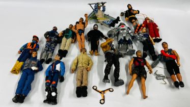 A BOX CONTAINING A GROUP OF 16 ASSORTED ACTION MAN FIGURES IN VARIOUS OUTFITS.