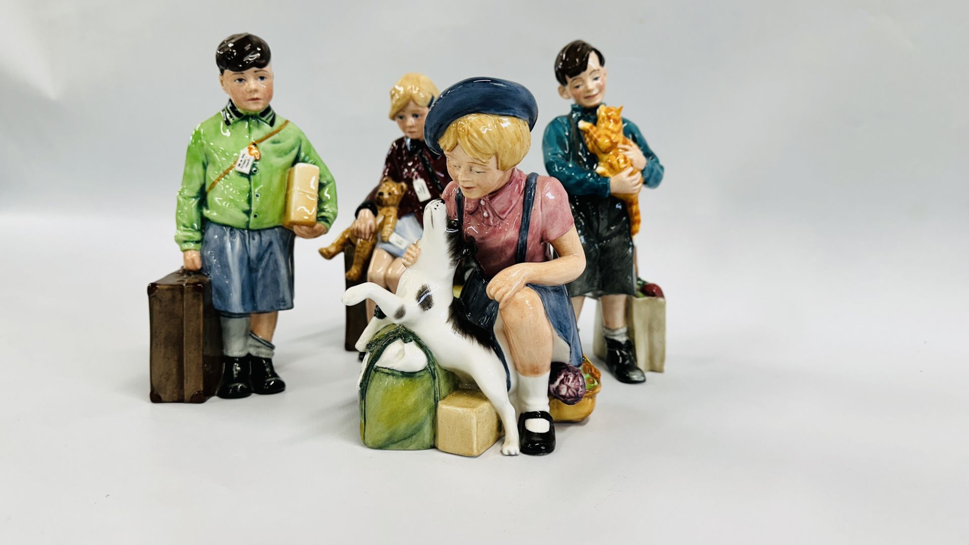 GROUP OF 4 ROYAL DOULTON EVACUEES FIGURES INCLUDING THE HOMECOMING,