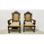 A PAIR OF C1870 HEAVILY CARVED OAK FRAMED OPEN ARM CHAIRS,