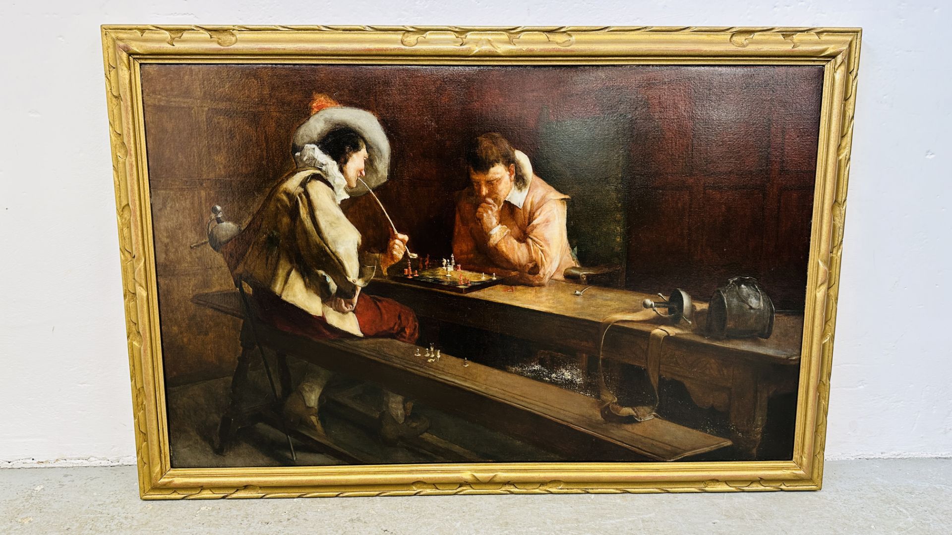 A REPRODUCTION OIL ON CANVAS OF DUTCH INTERIOR SCENE OF SEATED FIGURES PLAYING CHESS 65 X 100CM.