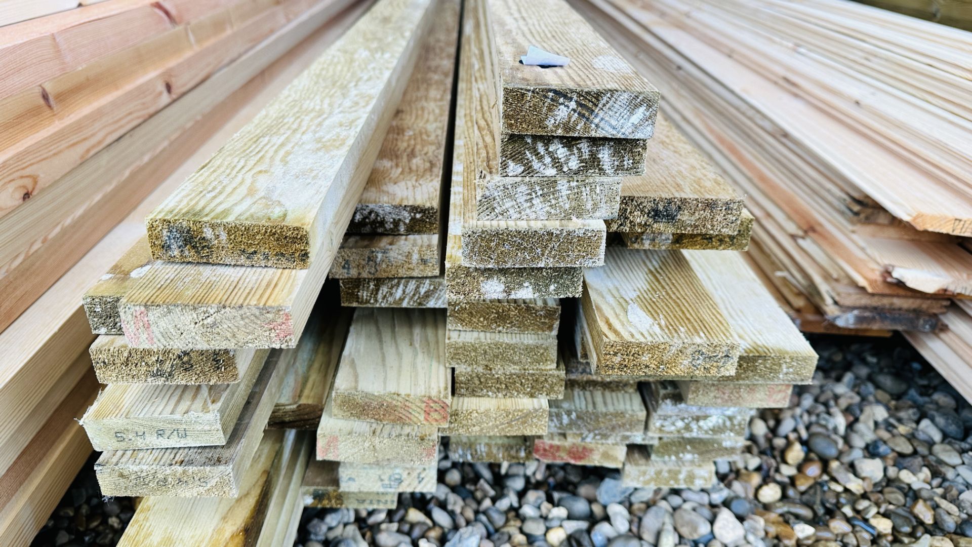 58 X 4.8M LENGTHS 70MM X 20MM PLANED TANALISED TIMBER. THIS LOT IS SUBJECT TO VAT ON HAMMER PRICE. - Image 2 of 6