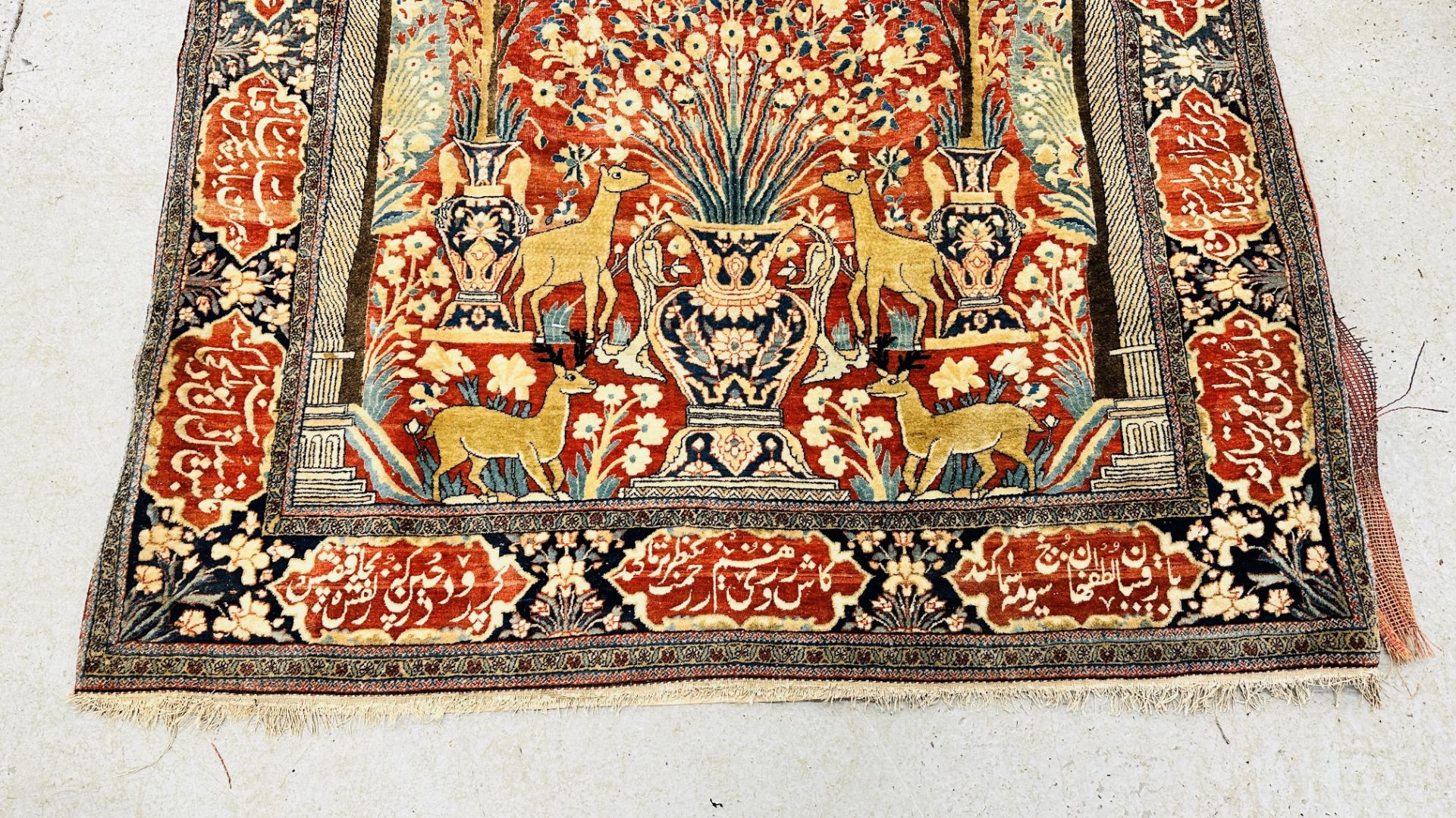 A PERSIAN DESIGN RUG DECORATED WITH SPRAYS OF FLOWERS AND DEER AND ARABIC INSCRIPTIONS, - Image 2 of 32