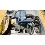 RYOBI HEAVY DUTY BELT SANDER MODEL EBS-1310V, IN CARRY CASE - SOLD AS SEEN.