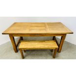 A SOLID OAK DINING TABLE WITH SINGLE DRAWER 180CM X 90CM ALONG WITH A JULIEN BOWEN BENCH SEAT 100CM.