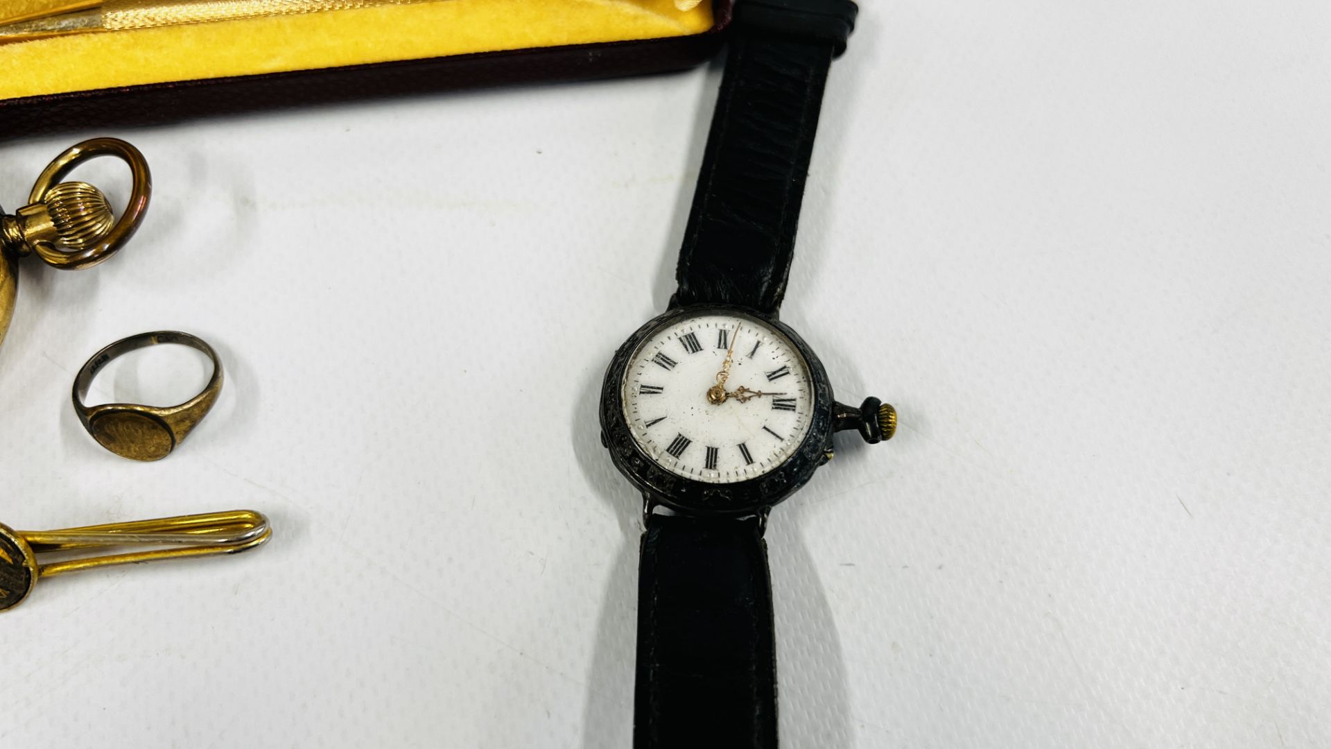 A VINTAGE WHITE METAL CASED WATCH WITH ENAMELED DIAL ON BLACK LEATHER STRAP, - Image 2 of 7