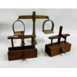 A SET OF VINTAGE WOODEN BEAM SCALES AND TWO BESPOKE WOODEN MOUSE TRAPS.