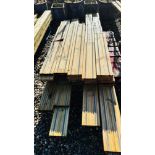 A PALLET CONTAINING APPROX 40 OFFCUT LENGTHS OF TANALISED DECKING WITH NON SLIP GRIP,